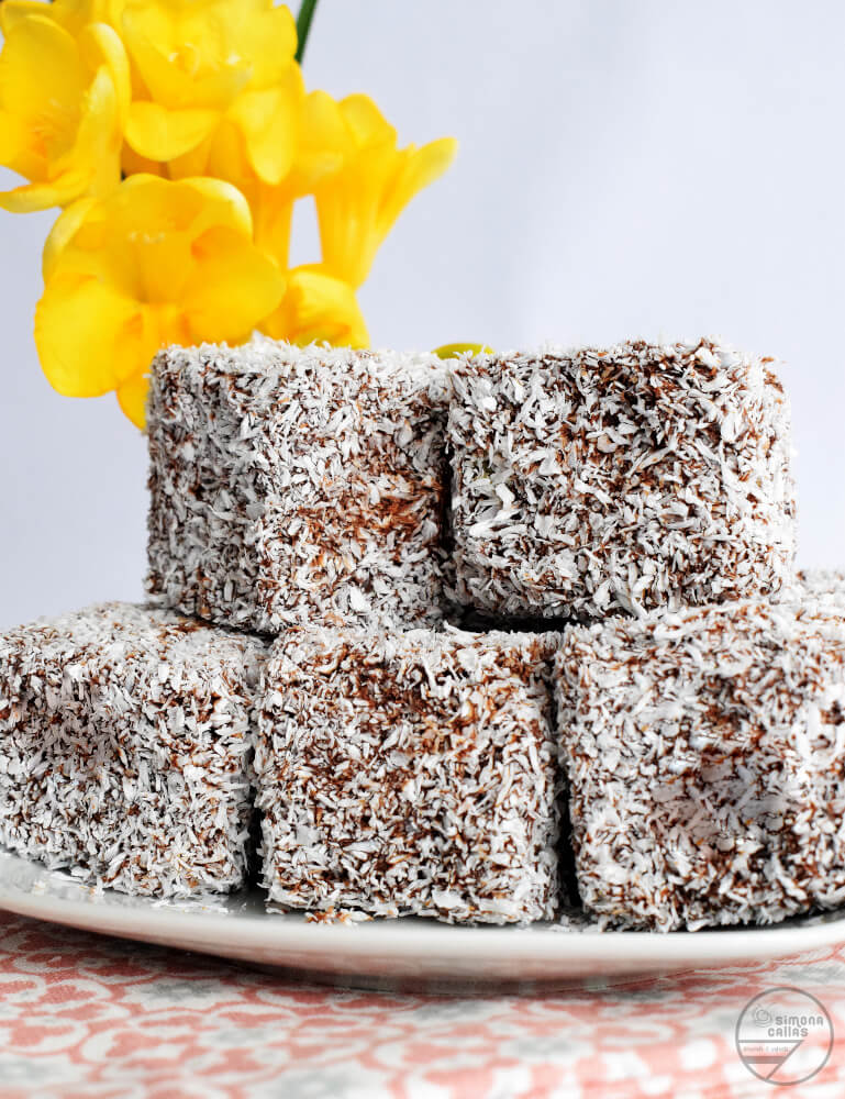Lamington cake squares  traditional Australian sponge cakes coated with  chocolate sauce and desiccated coconut Stock Photo  Alamy